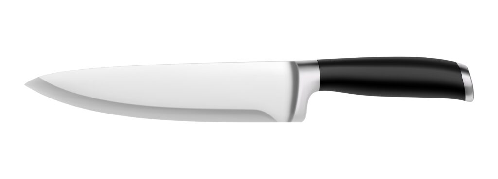 Metal chef's knife with the a black handle. The blade of the knife is on the left with the handle on the right. 